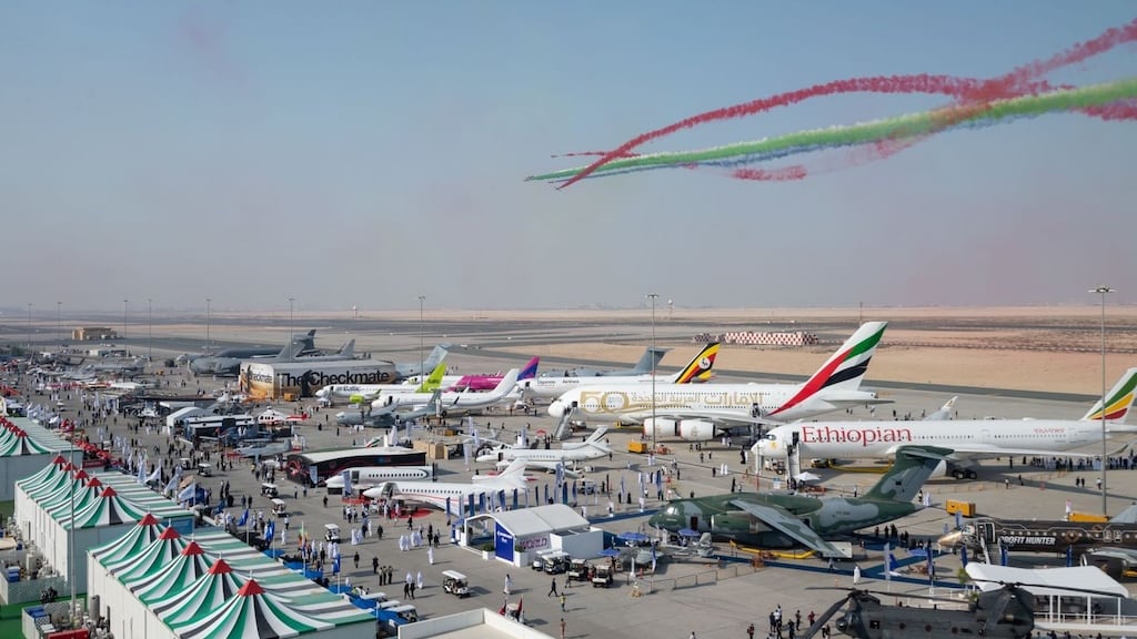 A next-generation fighter jet making a high-speed pass during the daily flying display.