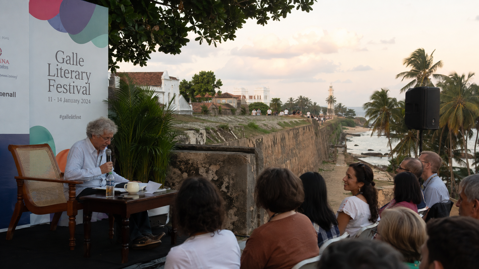 Literary talk beside the ramparts of Galle Fort overlooking the coast